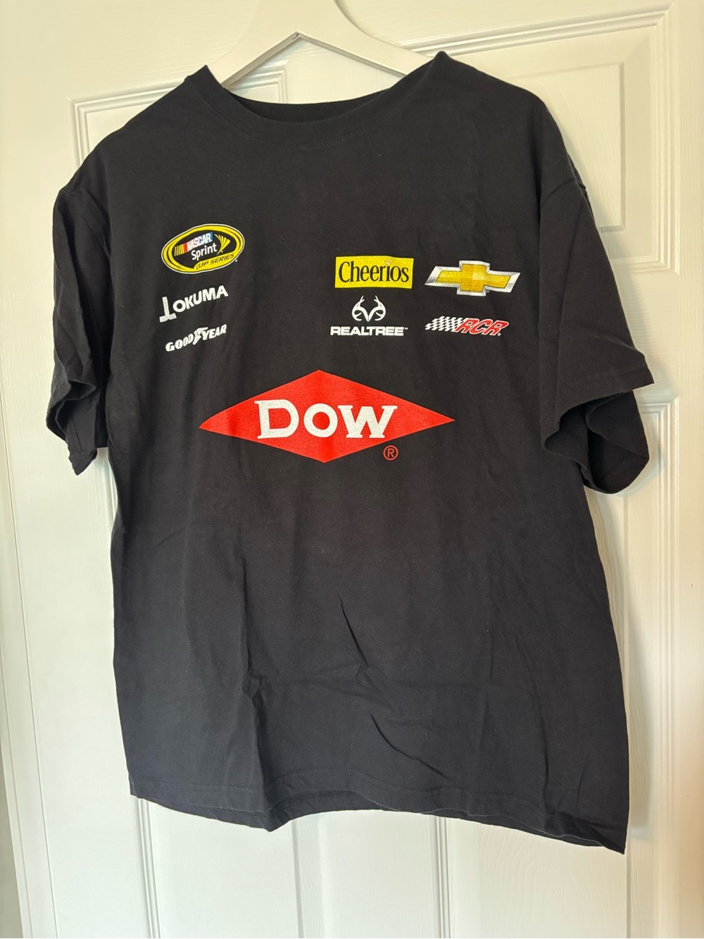 Chase Authentics Black Tee with Red DOW Logo and Multicolor Sponsor Prints